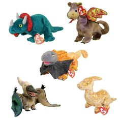 stuffed animals are arranged in the shape of dinosaurs