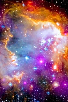 an image of the sky with many stars in it and some blue, purple, and red colors