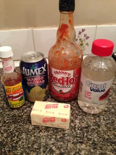 the ingredients to make this dish are displayed on the counter top, including sauces and seasonings