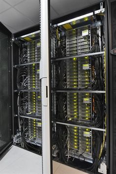 the inside of a server room with lots of wires