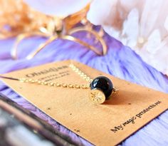 Gaze into the obsidian crystal ball and channel its protective energies. This 14k gold-plated necklace can serve as a reminder that your future is in your hands. ✨ Details: 15" chain 2" extender 14k gold-plated Obsidian crystal ball To care for your mystical necklace, avoid submerging in water and clean with a soft cloth. Explore more of our Jewelry Collection 🌲 Your order plants a tree and will ship within 1-4 business days. US shipping is free on orders $55+. We ship worldwide. © 2022, Goddess Provisions Goddess Provisions, Mystical Necklace, Crystal Ball Necklace, Crystal Point Necklace, Obsidian Crystal, Divine Feminine Energy, Ball Necklace, Crystal Set, Gold Necklaces