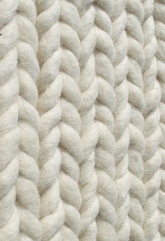 the texture of a blanket is white