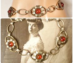 "I am SO thrilled to be offering a stunning Art Nouveau/Art Deco circa 1920s -1930s era 12 karat gold over sterling silver dark red glass cabochon flower link bracelet perfect for the Bride  The ornate flower shaped links feature deep red glass cabochon centers.  Note that it was tough to photo as the red is a true red/red with no hints of orange.   Bracelet measures 7 1/8 inches  (17.8 cm) around and is just under 5/8 inches at 9/16 inches (15 mm) wide.  This treasure is in excellent antique co Vintage Metal Bracelets For Weddings, Vintage Wedding Bracelet Jewelry, Red Art Deco Jewelry For Wedding, Retro Metal Bracelets For Wedding, Art Deco Gold Wedding Bracelets, Vintage Adjustable Jewelry For Wedding, Gold Art Deco Wedding Bracelets, Vintage Adjustable Wedding Jewelry, Adjustable Vintage Wedding Jewelry