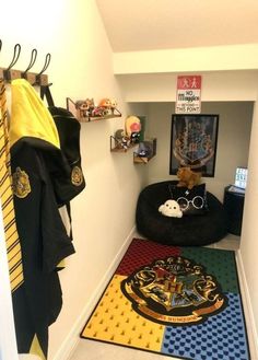 a hallway with harry potter themed rugs and other items on the floor in it