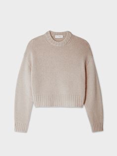 Instantly elevate every look this season with one of our standout knits: the Luxe Boxy Crewneck. Crafted from four ends of plush cashmere, this lofty sweater showcases an oversized fit enhanced by dramatic drop shoulder seams. Thick ribbed trims give definition to the cropped design. Details Oversized fit. Long sleeve. Length in size small is 19 1/2". The model is 5'10 1/2" and is wearing a size small. 100% Cashmere. Hand wash cold or dry clean. Do not twist or wring. Reshape and lay flat to dry Neutral Knits, Cashmere Travel Wrap, Travel Wrap, Travel Tops, Cardigan Top, Wrap Sweater, Sweater Sale, Outfit Inspo Fall, Knitwear Cardigan