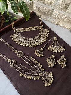 Set includes all jewelry pieces displayed. - Additional matching pieces can be added - Most sets can be customized to any color. Set is ready to ship as is 2-3 days within US. Please allow extra time for international or customized options. You can also reach us on Instagram @festiveessentials To see more pictures, videos or more options please message us on WhatsApp: +13137271045 All items in the picture are captured in light, color may vary due to the nature of product, color, and material. Co Heavy Silver Bridal Necklace For Marriage, Silver Kundan Necklace For Wedding Bollywood Style, Hand Set Kundan Necklace For Marriage, Hand-set Kundan Necklace For Marriage, Silver Chandbali Kundan Necklace For Marriage, Silver Kundan Necklace For Marriage In Temple Jewelry Style, Silver Kundan Bridal Necklace For Marriage, Chandbali Bridal Necklace With Intricate Design, Silver Chandbali Bridal Sets For Marriage