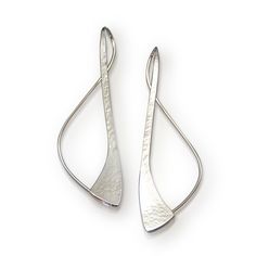 Silver Earrings - Path earrings in Argentium sterling silver. Hand fabricated from a single piece of wire - roll mill tapered and forged with hammer texture.  <br /> <br />Care and Cleaning: Argentium is tarnish resistant sterling and will tarnish more slowly than traditional sterling. When cleaning is needed, rub with fingers to remove light tarnish, clean with a silver polishing cloth for high-polished areas, or use a household green scrubbing pad to restore matte finish. Wearing r Hand Forged Long Drop Modern Earrings, Modern Twist Silver Earrings With Polished Finish, Modern Silver Earrings With Polished Finish, Modern Twist Silver Hammered Jewelry, Silver Earrings With Modern Twist And Polished Finish, Silver Hammered Sterling Silver Linear Earrings, Silver Earrings With A Modern Twist And Polished Finish, Silver Earrings With Polished Finish And Modern Twist, Elegant Hand Forged Silver Earrings