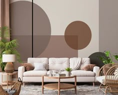 a living room filled with furniture next to a wall painted in shades of brown and white