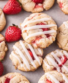 strawberry shortbread cookies with white icing and strawberries