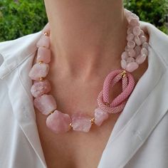 Raw rose quartz crystal necklace. Chunky statement natural gemstone beaded necklace for women. Large light pink handmade necklace with big bead and gemstone. Big bold bohemian bright necklace in gold color are suitable for an casual look, evening look and for a holiday. These necklace will be a good Christmas, anniversary, wedding or birthday gift for women, mom, wife, girlfriend, sister or daughter. Women's necklace with natural stone. It emphasizes the beauty of your neck and adds charm to you Large Bead Necklace Ideas, Bold Bohemian, Bright Necklace, Large Bead Necklace, Asymmetrical Necklace, Birthday Women, Jewelry Chunky, Necklace Big, Modern Necklace