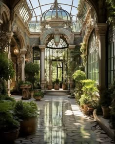 the inside of an ornate building with lots of plants and potted plants in it