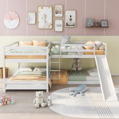 a child's bedroom with two bunk beds, a slide and stuffed animals on the floor