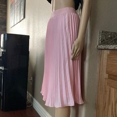 Kate Kasin Brand Nwt Is Very Elegant Baby Pink Pleated Skirt In Size Small Sophisticated Looking Skirt Feminine Solid Color Midi Skirt, Feminine Spring Pleated Skirt With Lining, Feminine Pleated Lined Skirt For Spring, Feminine Long Pleated Skirt For Spring, Spring Flowy Skirt With Pleated Hem, Stretch Skirt With Pleated Hem, Pleated Flared Mini Skirt In Feminine Style, Spring Stretch Pleated Midi Skirt, Pleated Flowy Skirt For Spring