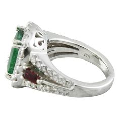 Stamped: 14K Total Ring Weight: 9 Grams Emerald Weight 3.80 Carat (11.60x9.00 Millimeters)Ruby Weight 0.40 Carat (4.20x2.20 Millimeters)Diamond Weight: 1.00 carat (F-G Color, VS2-SI1 Clarity )Face Measures: 15.30x13.70 Millimeter SKU: [600637] Luxury Emerald-cut Ruby Ring With Center Stone, Elegant Multi-stone Emerald Ring In Platinum, Luxury Multi-stone Emerald Ring In White Gold, Luxury Brilliant Cut Ruby Ring In Sterling Silver, Luxury Emerald-cut Ruby Ring In Sterling Silver, 14k White Gold Diamond Ring, White Gold Diamond Rings, White Gold Diamonds, Ruby