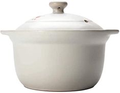 a white casserole dish with a lid