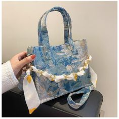 SPECIFICATIONSTypes of bags: Handbags & Crossbody bagsStyle: CasualShape: SquarePlace Of Origin: GUANG DONG ProvincePlace Of Origin: GUANG DONG ProvincePattern Type: FloralOrigin: CN(Origin)Occasion: PartyNumber of Handles/Straps: TwoMain Material: TPULining Material: PolyesterHardness: SoftHandbags Type: Shoulder BagsGender: WOMENExterior: Open PocketClosure Type: zipper Large Capacity Blue Satchel For Evening, Blue Large Capacity Satchel For Evening, Chic Blue Satchel As A Gift, Blue Square Satchel As Gift, Blue Square Satchel For Gift, Blue Square Bag With Chain Strap, Blue Tote Shoulder Bag With Chain Strap, Trendy Blue Square Box Bag, Trendy Blue Shoulder Bag For Gift