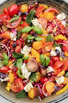 a bowl filled with lots of different types of vegetables