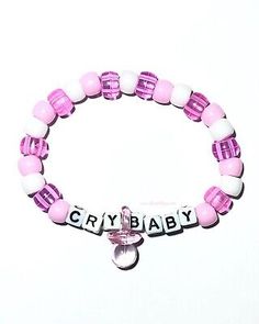 CRY BABY Kandi Beaded BraceletThis bracelet is made with baby pink, transparent pale pink, and white pony beads with the wording CRY BABY and a transparent pale pink pacifier in between the wordsAvailable SizesOSFM5 - 5.5 inches 5.5 - 6 inches 6 - 6.5 inches 6.5 - 7 inches 7 - 7.5 inches 7.5 - 8 inches 8 - 8.5 inches 8.5 - 9 inches If you need a certain size not available please send us a message. Adjustable Beaded Bracelets For Birthdays, Cute Beaded Crystal Bracelet Gift, Cute Beaded Crystal Bracelet For Gift, Cute Beaded Crystal Bracelet As Gift, Adjustable Beaded Crystal Bracelet For Birthday, Adjustable Beaded Charm Bracelet For Birthday, Anime Relatable, Melanie Concert, Edc Bracelets