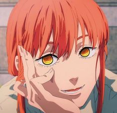 an anime character with orange eyes and long red hair holding her hand up to her face