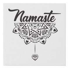 namaste written in black ink on a white background stretched canvas wall art print