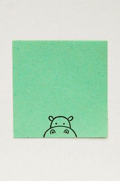 a sticker with an image of a hippo on it