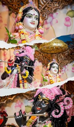 two statues of hindu deities on display in front of a floral wallpapered background