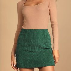 Product Details Set The Bar For Style In The Lulus High Class Emerald Green Corduroy Mini Skirt! Lightweight Ribbed Corduroy Fabric Shapes This Sweet Little A-Line Style Mini Skirt, Complete With A High Fitted Waist And A Slightly Flared Hem. The Flirty Length Is Perfect For Pairing With Your Favorite Over-The-Knee Boots! Hidden Back Zipper. Fully Lined. Shell: 100% Polyester. Lining: 97% Polyester, 3% Spandex. Hand Wash Cold. Do Not Bleach. Line Dry. Iron Low Heat. Trendy Corduroy Mini Skirt For Winter, Trendy Winter Corduroy Mini Skirt, Casual Corduroy Mini Skirt For Winter, Trendy Green Mini Skirt For Winter, Fitted Corduroy Mini Skirt For Winter, Green Casual Mini Skirt For Winter, High Waist Fitted Corduroy Mini Skirt, Fitted Green Mini Skirt For Winter, Chic Green Mini Skirt For Winter