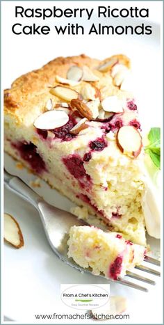 a piece of raspberry ricotta cake with almonds on a white plate