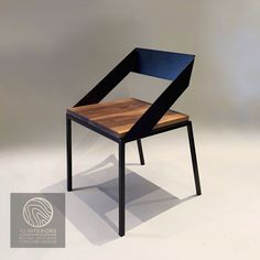 a chair made out of wood and metal