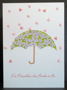 a greeting card with flowers and an umbrella on the front that says for prusalla, the bride to be