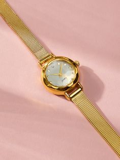 This dainty round face watch, features a slim gold mesh wrist band. Slim in style, this watch is perfect to add to a wrist stacked with bracelets or alone for a sophisticated style. Women Watch Petite, Small Womans Watch, Women Watches Waterproof, Watches Young Women, Women’s Silver And Gold Watch Band, Women Watches Sport, Cheap Minimalist Watches, Affordable Classic Metal Watch Accessories, Cheap Classic Metal Watch Accessories