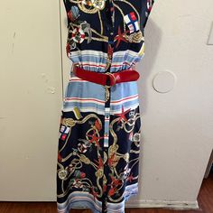 This Beautiful Nautical Dress Is Sleeveless, Buttons Down The Front, Is Unlined, Has Elastic In The Waist Front And Back, And Has A Red Belt. The Bust Is 36, The Waist.Is 26, The Hip Is 42, And The Length Is 46. This Dress Is New With Tags And Has No Blemishes. Zara Sleeveless Summer Dress For Beach, Zara Sleeveless Summer Beach Dress, Zara Summer Sleeveless Dress For Beach, Zara Summer Sleeveless Beach Dress, Navy Marine Style Summer Dress, Zara Sleeveless Dress For The Beach, Zara Sleeveless Midi Dress For Beach, Zara Sleeveless Beach Dress, Nautical Dresses For Summer Vacation