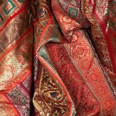 an assortment of different colored and patterned fabrics