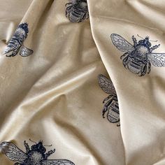 the fabric has bees on it