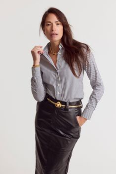 The Icon Shirt runs tailored at the waist, chest and back. For a contemporary fit, order true size. For a blousier fit, size up, or consider The Boyfriend Shirt for an even looser look. Our perfect fit cotton stretch button down now in a fun and fashionable stripe! Not to worry, your favorite fit is still here but we've added this sublime stripe. Best of all? Our patented No Gape® button technology has got you covered. We designed our best-selling Icon Shirt to be fitted throughout, giving you a Timeless Fitted Tops For Workwear, Timeless Fitted Tops For Work, Timeless Slim Fit Button-up Tops, Timeless Slim Fit Tops For Office, Timeless Slim Fit Office Tops, Timeless Tops For Business Casual With Relaxed Fit, Timeless Relaxed Fit Top For Business Casual, Timeless Fitted Top For Business Casual, Timeless Spread Collar Tops For Office Wear