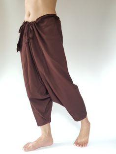 "⬇️ SHOP HERE https://www.etsy.com/ch-en/shop/IndycraftsDesigns Aladdin Pants, Harem Pants 100% Cotton Unisex pants, perfect for yoga, The fabric is cotton soft, lightweight, and airy, ideal for those warm days. If it's a bit chilly, you could always wear leggings underneath. super comfortable cotton pants made of light, comfortable to wear 100% cotton. Cotton is a natural material that wicks moisture to keep you cool, comfy & dry. Floral printed, elastic waistband,medium-weight, Soft and Co Ninja Pants, Samurai Pants, Cotton Harem Pants, Yoga Trousers, Unisex Pants, Travel Pants, Maternity Pants, Womens Pants, Olive Color