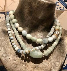 "This is a stunning trio of statement necklaces. Pale green jade gemstones necklace, worn together with egg shaped milky aquamarine stones and sliced milky aquamarine stones. All these create a stunning combination and a bohemian look. This necklaces can be worn together or separately and will work for everyday or with an evening dress. Each necklace can be purchased separately for $240 usd. Dimensions: length - 17\" - 19\" (including clasp) extender- can be added by request *If, for any reason, Elegant Amazonite Bead Necklaces, Elegant Amazonite Beaded Necklace, Handmade Elegant Amazonite Necklace, Elegant Round Amazonite Necklace, Elegant Amazonite Gemstone Beads Jewelry, Turquoise Aquamarine Gemstone Beads Necklace, Turquoise Aquamarine Beaded Necklace, Elegant Amazonite Round Beads Jewelry, Elegant Amazonite Gemstone Beaded Necklace