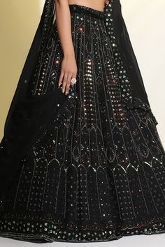 Black cancan attached lehenga featuring sequin, bead, cutdana, resham work all over. Paired with a sequin flower embellished padded blouse and dupatta. - Aza Fashions Party Sharara With Motifs For Navratri, Navratri Party Sharara With Motifs, Embellished Evening Dress For Navratri, Navratri Party Lehenga With Motifs, Party Lehenga With Motifs For Navratri, Embellished Black Saree Dress, Festive Party Lehenga With Motifs, Black Embellished Saree Dress, Diwali Party Anarkali Set With Motifs