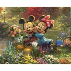 two mickey and minnie mouses are hugging in the grass with flowers on either side