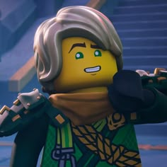 the lego movie character is dressed in green and gold