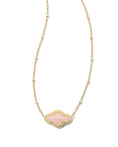 An homage to our iconic medallion—representing joy, optimism, possibility, and femininity—meet the Abbie Gold Pendant Necklace in Rose Quartz featuring an elegant, elongated silhouette.,Metal14k Gold Over BrassMaterialRose QuartzClosureSpring Ring claspSize18 chain , 0.72L X 0.41W pendantDue to the one-of-a-kind nature of the medium, exact colors and patterns may vary slightly from the image shown.} | Kendra Scott Abbie Gold Pendant Necklace in Rose | Quartz New Kendra Scott Necklace, E Newton Necklace, Kendra Scott Jewelry Aesthetic, Pink Kendra Scott Necklace, Pink Kendra Scott, Pink Necklaces, Preppy Necklaces, Birkenstock Boston Shearling, Boston Shearling