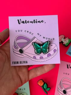 a hand holding a card that says valentine, you croc my world from - divya