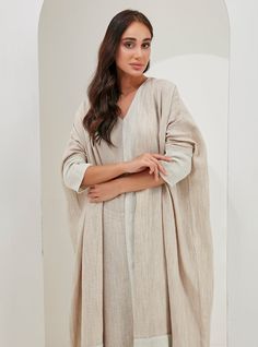 Silver Piping Luxury Light fabric is perfect for a hot summer. Three-piece Scarf İnner dress Abaya Kaftan Set Two side colour scarf you can choose the colour you like Model height: 175 CM 90% Cotton 10% LinenLength: 140cm Spring Vacation Long Sleeve Abaya, Elegant Beach Abaya For Spring, Elegant Spring Beach Abaya, Elegant Long Sleeve Summer Abaya, Long Beige Dress For Eid, Long Beige Dresses For Eid, Beige Long Dress For Eid, Free Size Long Abaya For Eid, Long Sleeve Abaya For Summer Vacation