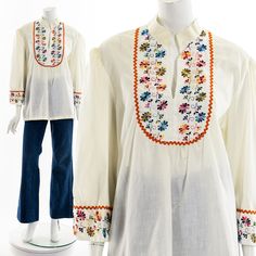 - 60s/70s off-white embroidered tunic blouse Label: Fashion ReWork Tag Size:   Fits like:  L Material:  cotton polyester Condition:  Good to Great Clipped on Mannequin:  No ✂ SIZE + FIT ✂ Length: 28" / 71 cm Shoulders, seam to seam: 17" / 43 cm Sleeve Length: 21" / 53 cm Bust: 48" / 122 cm Waist: 48" / 122 cm All measurements are taken with garment lying flat. ALWAYS refer to measurements as vintage sizes can vary greatly from today's modern sizes. We recommend comparing measurements above with a similar style garment you own for best fit before purchasing.  DRESS FORM / MANNEQUIN is wearing the size detailed above but she typically measures a size 4/6 by modern retail sizes or a general size small. Belt Accessories and other clothes are NOT included. ▲▲All Garments Have Been Laundered/Ste Vintage White Embroidered Top For Spring, Vintage Cotton Embroidered Top For Spring, White Cotton Hippie Blouse, Vintage Cotton Blouse With Chikankari Embroidery, Casual White Embroidered Tunic, Embroidered Off White Cotton Blouse, 1970s Style Cotton Blouse For Spring, Off White Embroidered Cotton Blouse, Vintage Cotton Top With Multicolor Embroidery