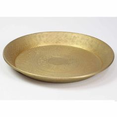 a gold plate on a white background