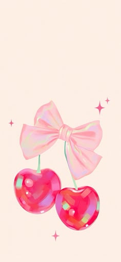 two cherries with a bow on them