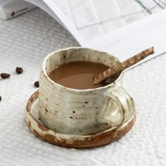 a cup of coffee sitting on top of a saucer