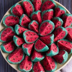 watermelon slices are arranged on a plate