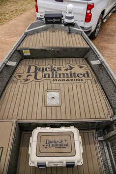 the back end of a pickup truck with its bed open