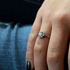 Little Daisy Ring, Sterling Flower Ring, Boho Flower Ring, Bridesmaid Ring, Antiqued Ring, Silver Daisy Ring, Mothers Day Ring What a sweet little sterling silver daisy ring to wear through the seasons! New to LGR and so unique and fun that its sure to draw lots of attention for sure! A beautiful gift of love for mom, bridesmaids, sisters, and besties too! Great gifts for any and all occasions when a smile on her face is required. ✦This listing is for the (sterling silver daisy ring with the cop Sunflower Design Rings As Gifts, Adjustable Flower-shaped Promise Ring, Flower Shaped Stackable Rings For Gift, Dainty Adjustable Flower-shaped Rings, Dainty Adjustable Flower Shaped Rings, Dainty Flower Ring With Flower Charm, Delicate Adjustable Flower-shaped Ring, Sunflower Design Flower Ring For Gift, Dainty Adjustable Flower Ring